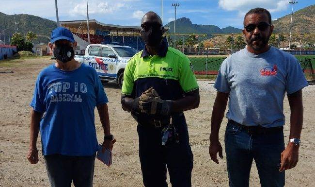 Community officers with together with a community partner assisted coach Tom at the Little League Stadium