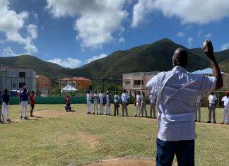 Minister Samuel delivers the game two opening pitch