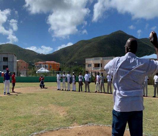 Minister Samuel delivers the game two opening pitch