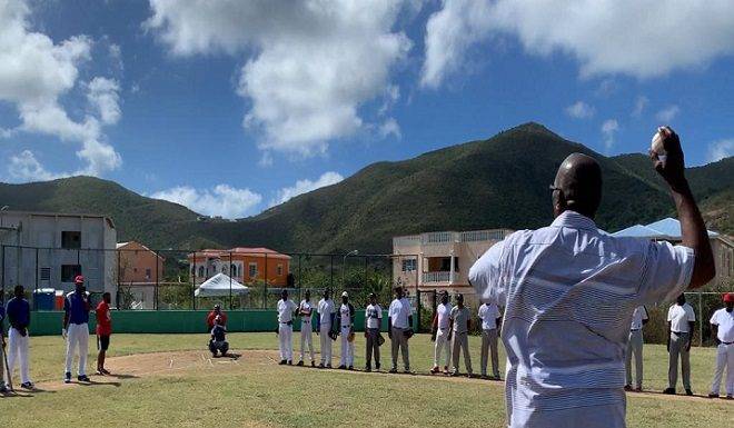 Minister Samuel delivers the game two opening pitch