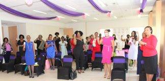 20 Women Honored on IWD for Exemplary Work in their Community A toasts by the attendees.