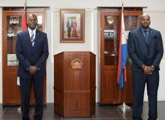Mr. Omar Ottley as Minister of Public Health , Social Development and Labour