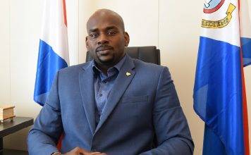 Minister Ottley signs off updated incidental work instruction that strengthens local labor resources.