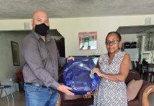 Chris Wever donates school bags with school supplies to Benjamin foster home