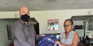 Chris Wever donates school bags with school supplies to Benjamin foster home