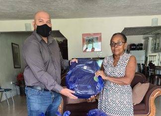 Chris Wever donates school bags with school supplies to Benjamin foster home