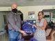 Chris Wever donates school bags with school supplies to Benjamin foster home