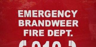 A small structure catches fire on the cricket field