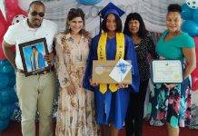 Island Gems presents laptops to two valedictorians