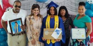 Island Gems presents laptops to two valedictorians