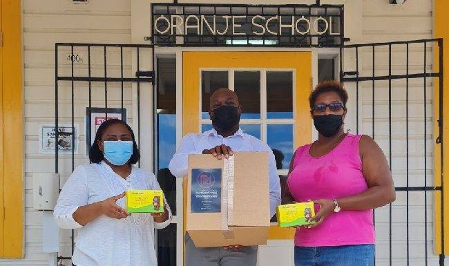 RM Productions donates masks and hand sanitizing dispensers to all elementary public schools.