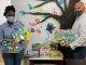 Wever donates reading books, supplies to Excellence Academy