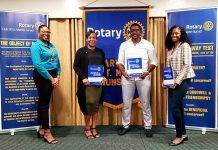 Rotary Sunset Inducts Three Professionals