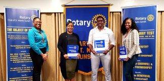 Rotary Sunset Inducts Three Professionals