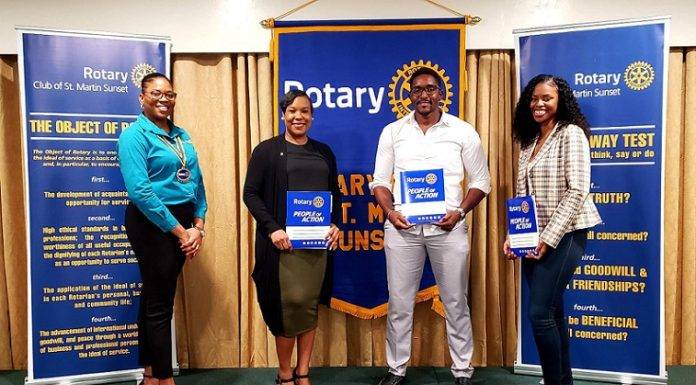 Rotary Sunset Inducts Three Professionals