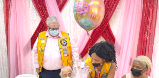Sint Maarten Lions Club Members celebrate 100th Birthday with Ms. Olive Hodge- Wilson.
