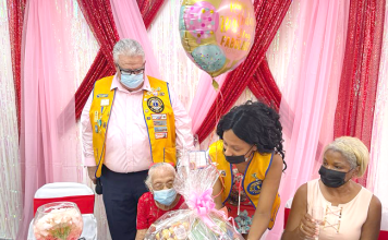 Sint Maarten Lions Club Members celebrate 100th Birthday with Ms. Olive Hodge- Wilson.