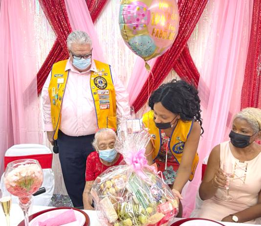 Sint Maarten Lions Club Members celebrate 100th Birthday with Ms. Olive Hodge- Wilson.