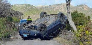 Car flips over in Statia