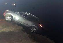 Car drives over the cliff