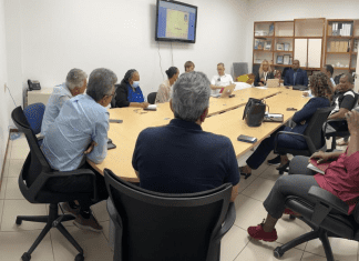 Minister Ottley meets with the exit strategy team to discuss the steps towards normalcy.