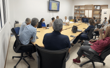 Minister Ottley meets with the exit strategy team to discuss the steps towards normalcy.