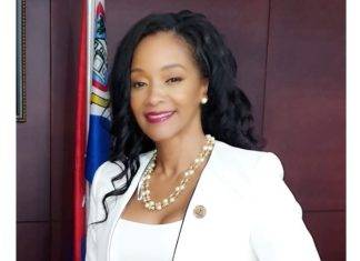MP Angelique Romou congratulates Young St. Maartener Kyeisha Laurence on being the first from St. Maarten to be accepted to the Prestigious Harvard Medical School