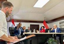 Island Council discusses service, plans of Satel NV Satel NV representative Tim van Oosteren (left) answering the many questions that were posed by the Island Council.