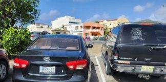 Sint Maarten Police Force and VROMI Ministry Address Abandoned Vehicles in Philipsburg Area