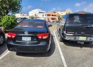 Sint Maarten Police Force and VROMI Ministry Address Abandoned Vehicles in Philipsburg Area