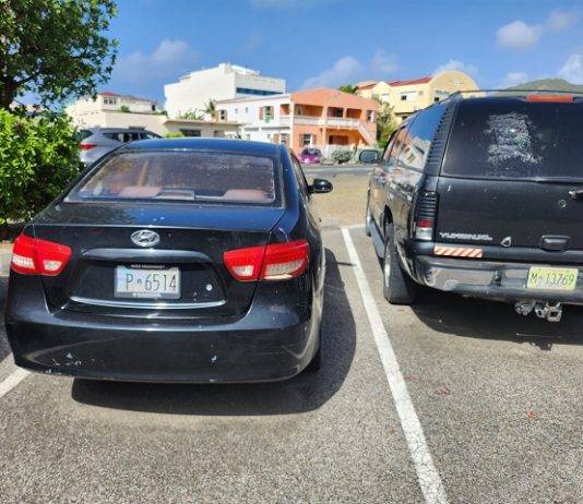 Sint Maarten Police Force and VROMI Ministry Address Abandoned Vehicles in Philipsburg Area