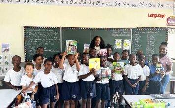 MP Angelique Romou Donates Books in Honor of International Literacy Day