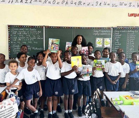MP Angelique Romou Donates Books in Honor of International Literacy Day