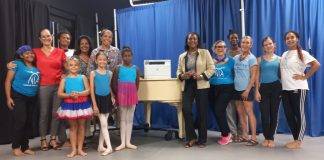 Island Gems supports NIA with piano dolly and printer