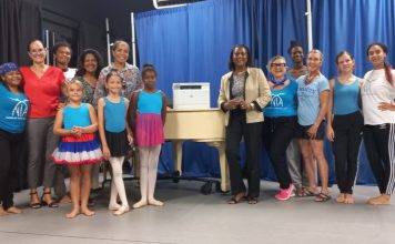 Island Gems supports NIA with piano dolly and printer