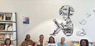 Island Gems donate French history and geography textbooks to Lycée polyvalent