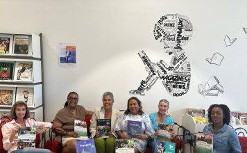 Island Gems donate French history and geography textbooks to Lycée polyvalent
