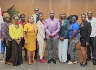 Acting Minister of ECYS Lyndon Lewis meets with WITU