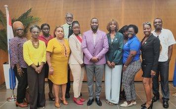 Acting Minister of ECYS Lyndon Lewis meets with WITU