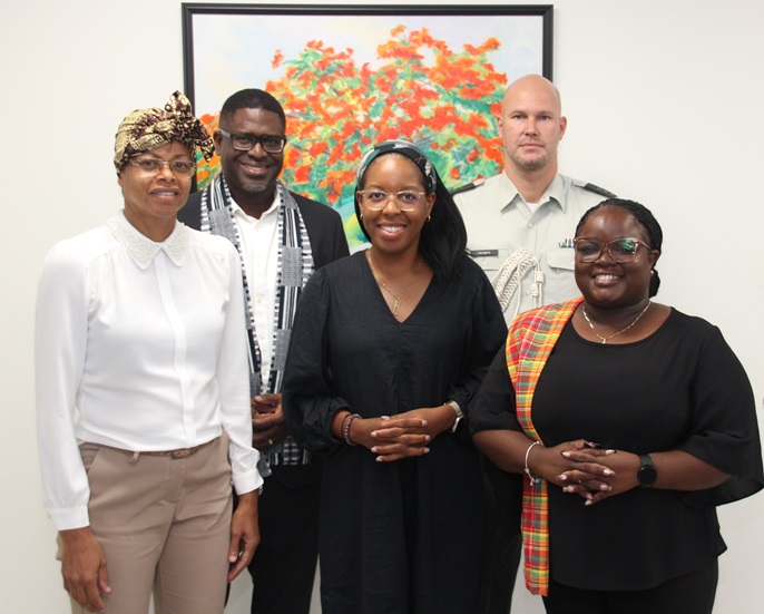 Members of the Organizing Committee (front l-r) Ms. Xiomara Balentina, Ms. Makhicia Brooks (Chair), Ms. Shurna Archangel / (back) Mr. Dwayne President and Mr. Frens Hartgers (Aide-de-Camp to the Governor)