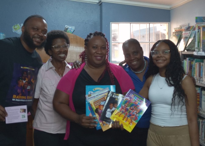 In the caption from left to right: Author Heddrick McBride, Author Mary Romney – Schaab, Librarian Mariland Powell and Shirley Richardson and Author Skylar McBride.