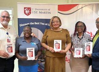 Minister Marinka Gumbs Presents USM with book on Claude to mark his 98th birthday