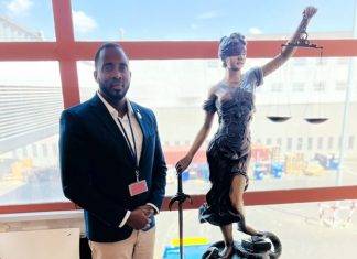 Minister of Justice Lyndon Lewis addresses increase in gun violence