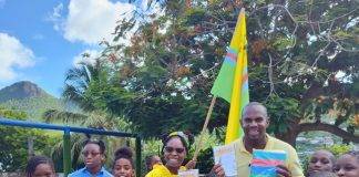 St. Martin Unity Flag presentation to MAC Community School students