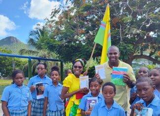 St. Martin Unity Flag presentation to MAC Community School students