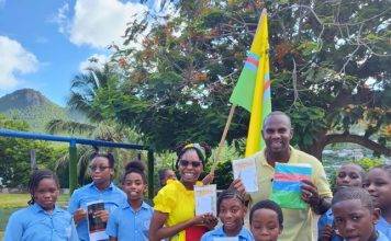 St. Martin Unity Flag presentation to MAC Community School students