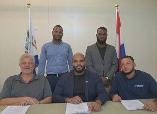 Minister VROMI Gumbs signs Trenching Contracts, Continues to Address Outstanding Projects