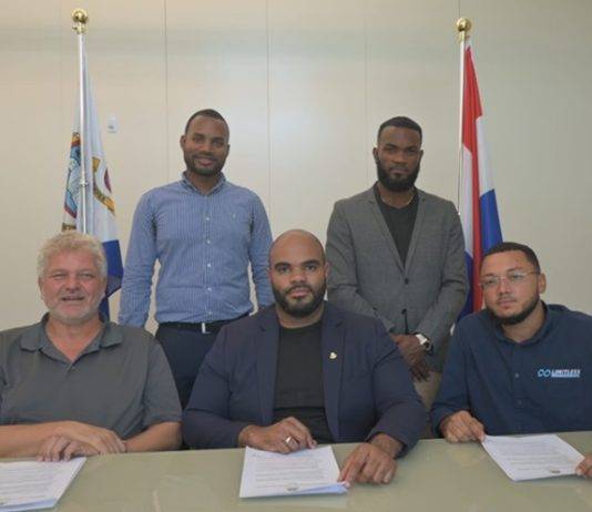 Minister VROMI Gumbs signs Trenching Contracts, Continues to Address Outstanding Projects