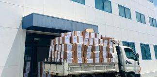 Minister of Finance Marinka Gumbs Joins in Clean Up of Tax Office 560 boxes removed to create better working environment