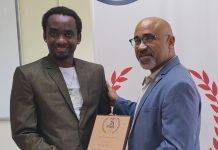 USM Honours Henry Michel for 35th Anniversary Logo Design